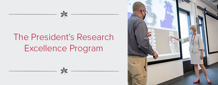 President Johnson and researcher looking at presentation spinal research