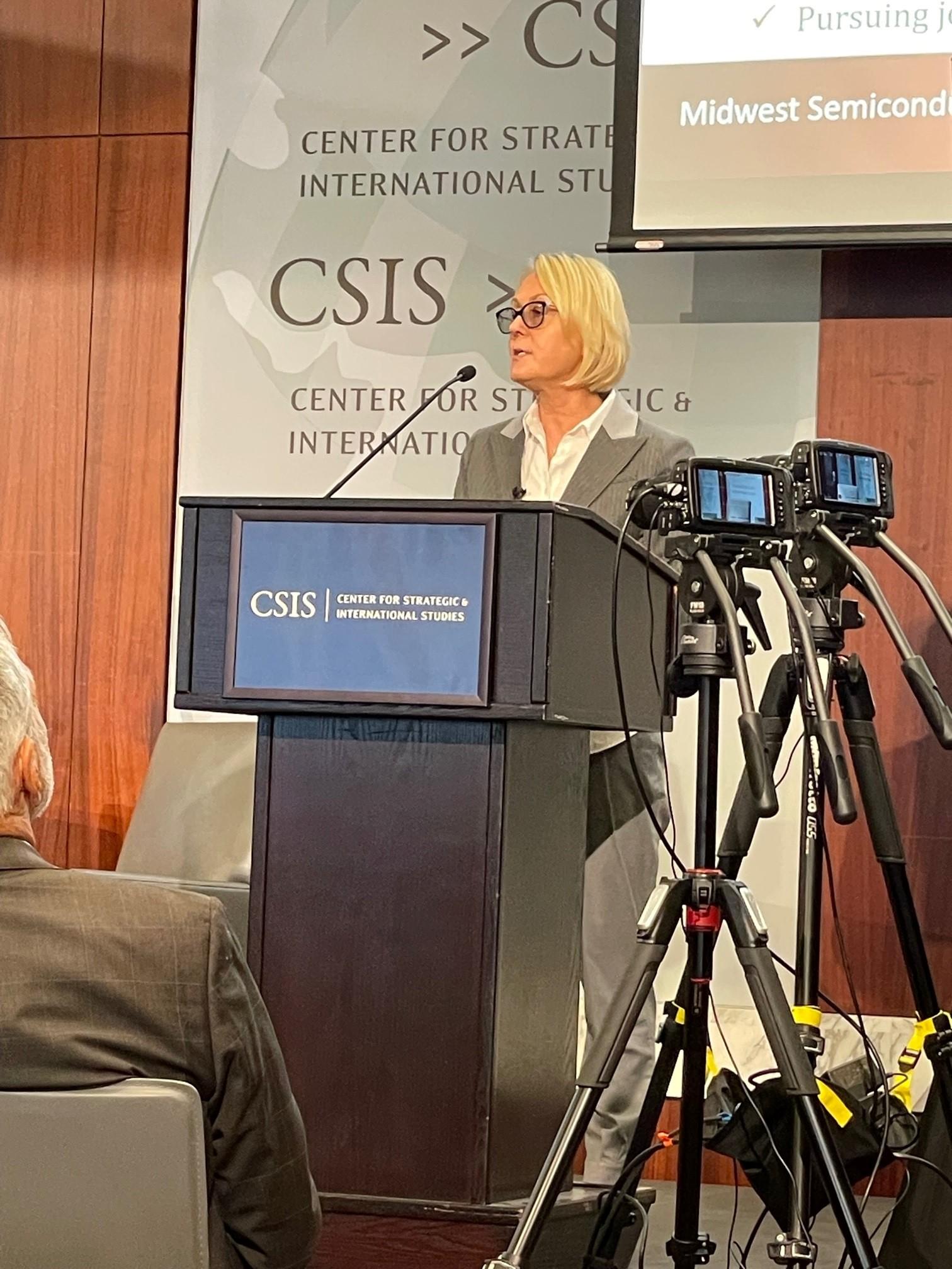 Dorota Grejner-Brzezinska standing at a podium and speaking to a group of people