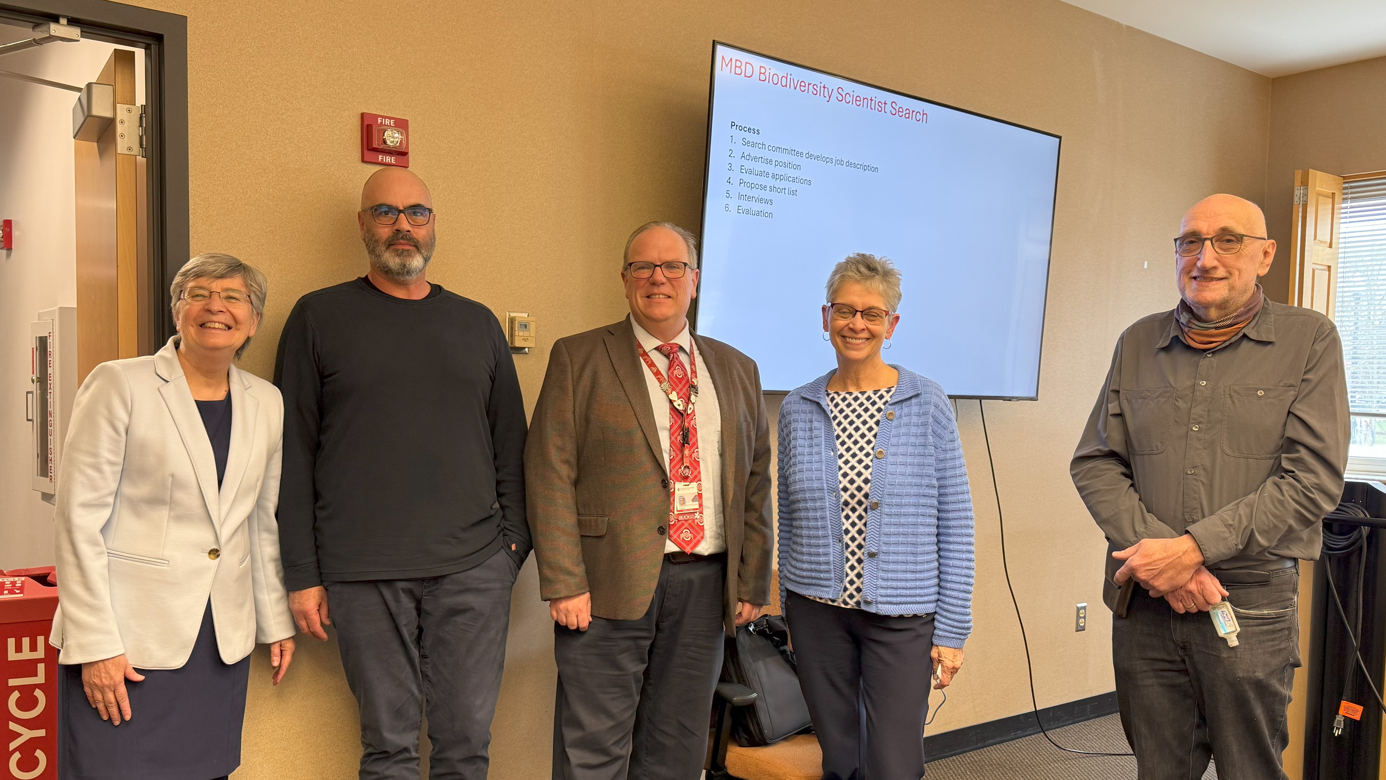 Carstens with research and department leaders