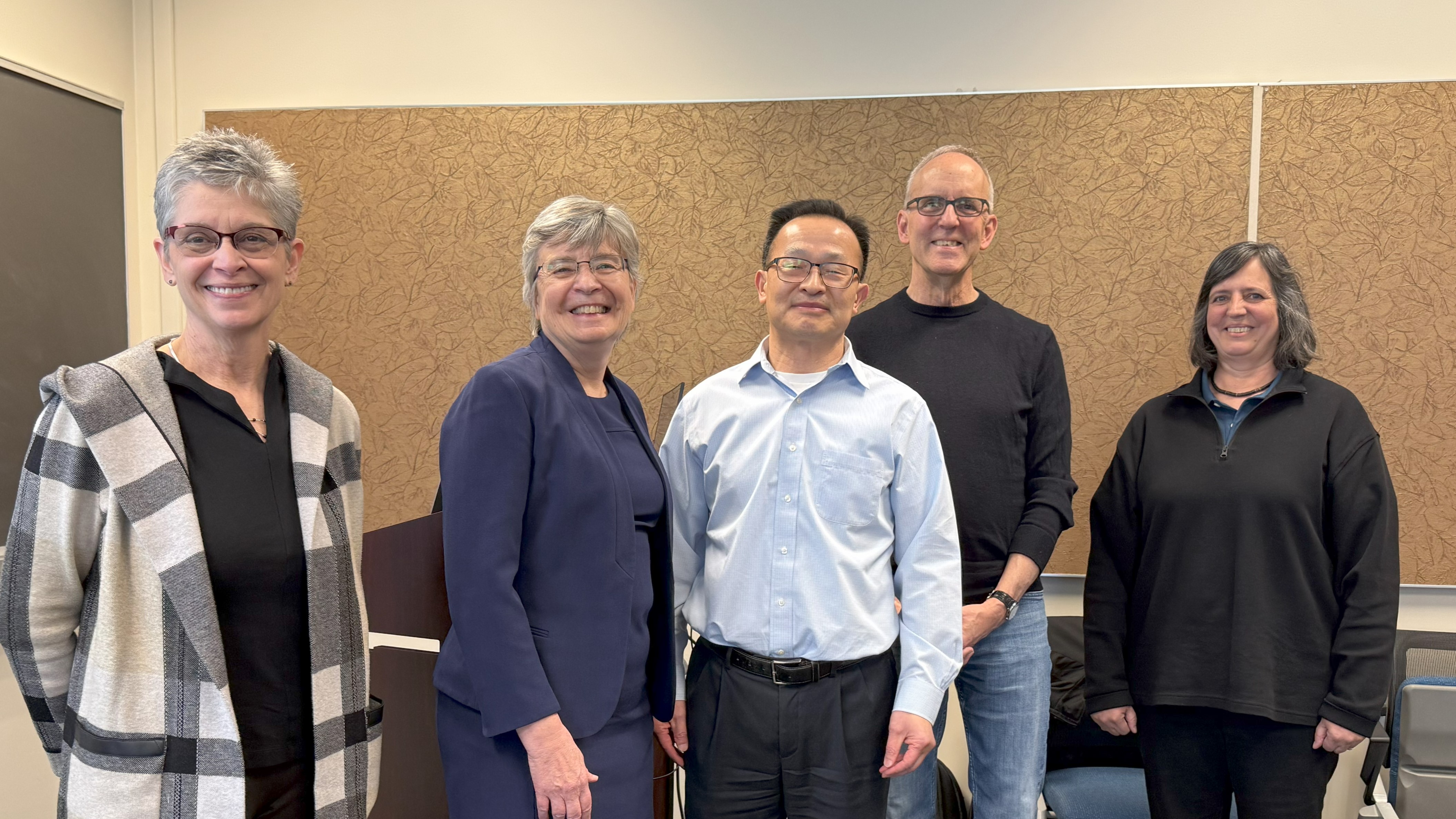 Dehua Pei with research and department leadership