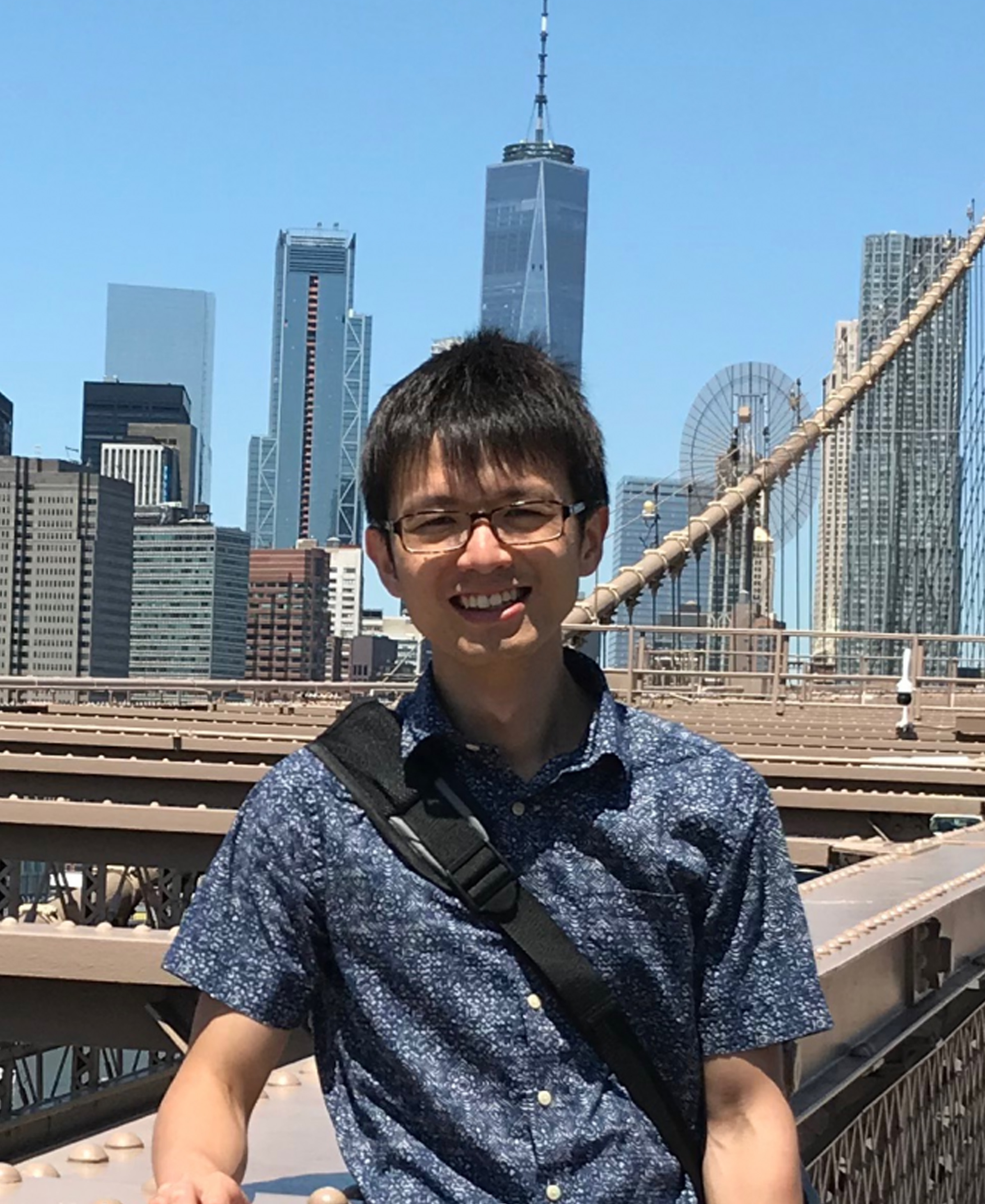 Chao with the New York city skyline in background