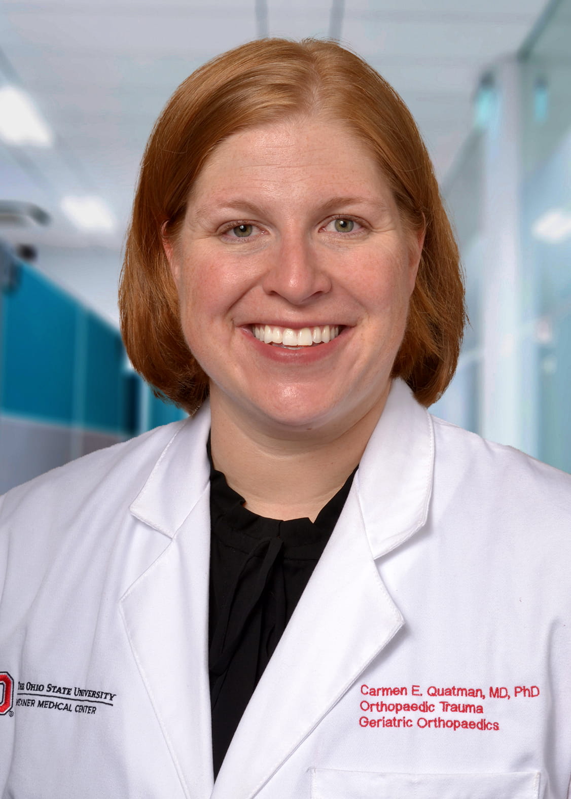 Carmen Quatman photographed in a medical center white coat