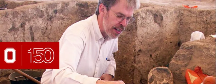 Clark Spencer Larsen of Anthropology excavating human bones