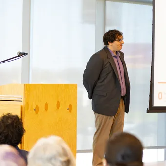 Matthew Steinhauer presents in front of an audience