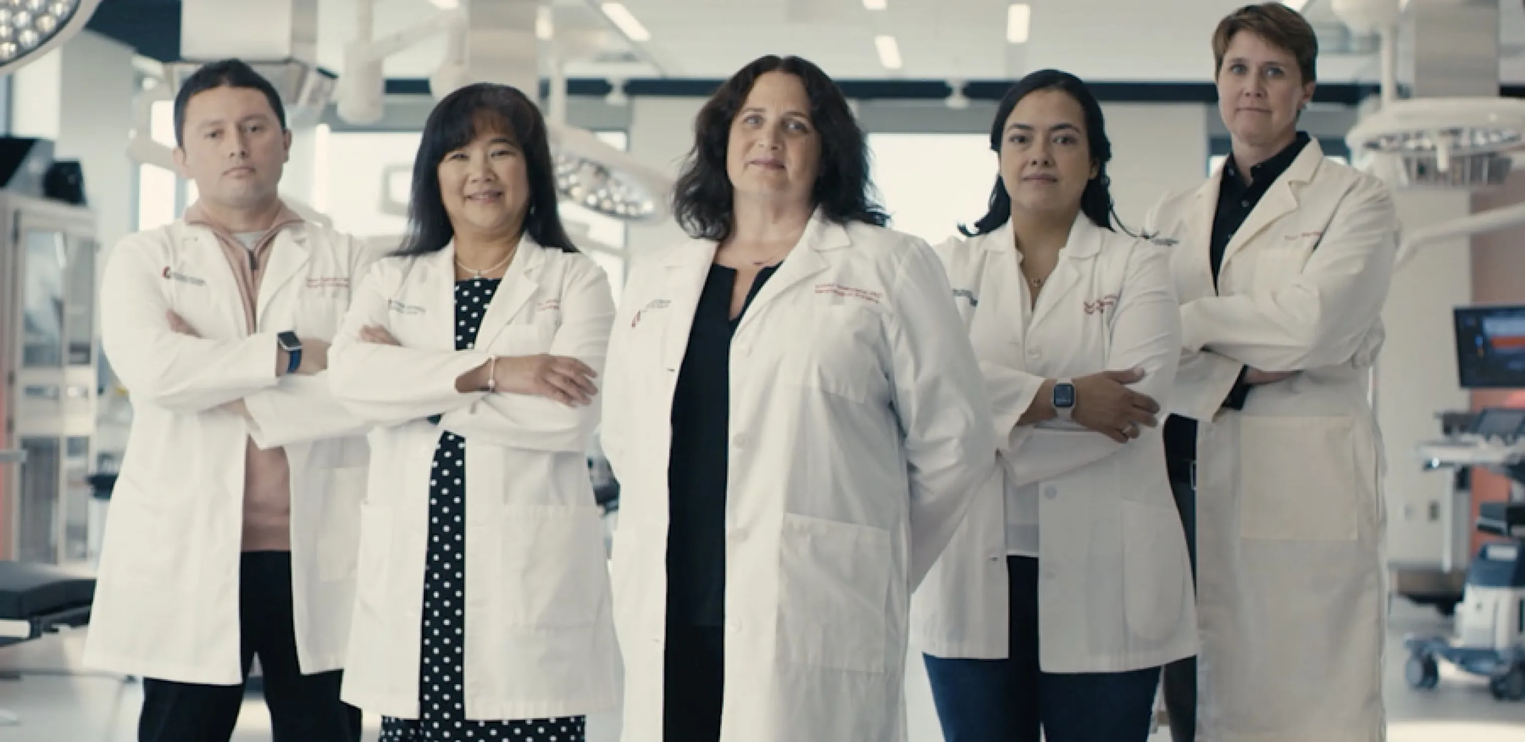 Five Ohio State researchers in lab coats