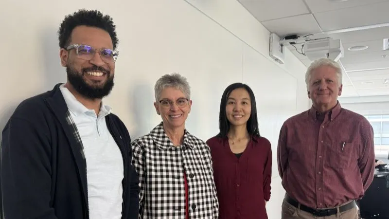 Leadership congratulates Jinghua Li on her award.