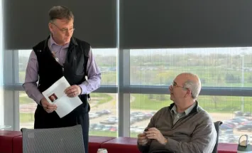 John Horack presents Matthew Ringel with his award.