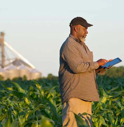 research on ipad standing in the middle of a farm field