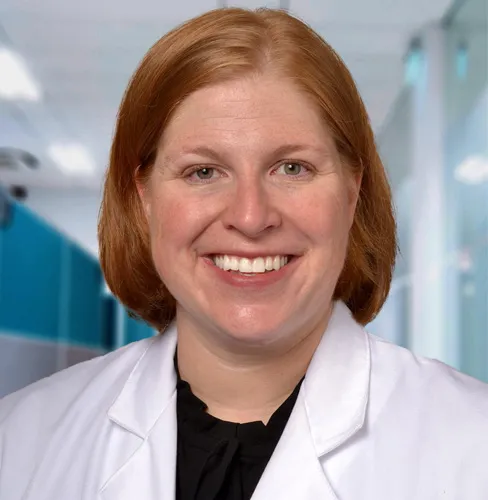 Carmen Quatman photographed in a medical center white coat