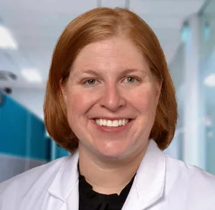 Carmen Quatman photographed in a medical center white coat